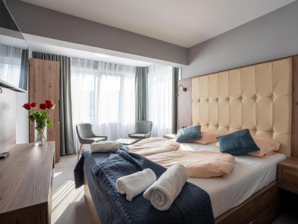 ECHO Boutique Rooms : photo 3 de la chambre chambre double deluxe avec lit d'appoint