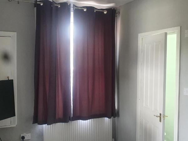 Tower Gardens Residence : photo 9 de la chambre chambre double avec salle de bains privative