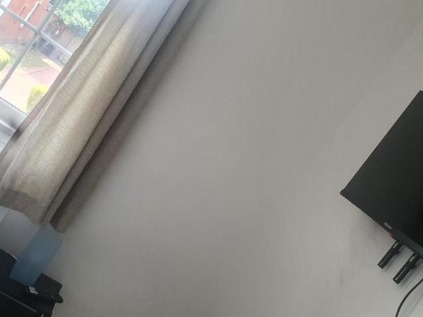 Tower Gardens Residence : photo 2 de la chambre chambre simple avec salle de bains commune