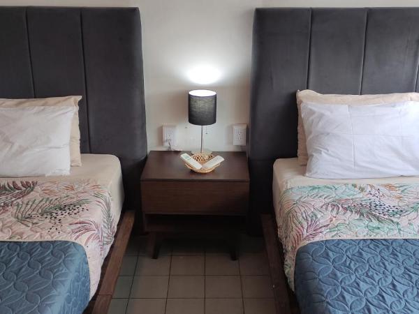 Leveli Coliving : photo 5 de la chambre chambre lits jumeaux deluxe