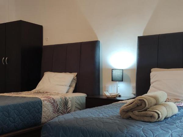 Leveli Coliving : photo 7 de la chambre chambre lits jumeaux deluxe