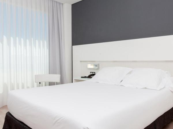 Axor Feria : photo 4 de la chambre chambre double avec navette aéroport gratuite