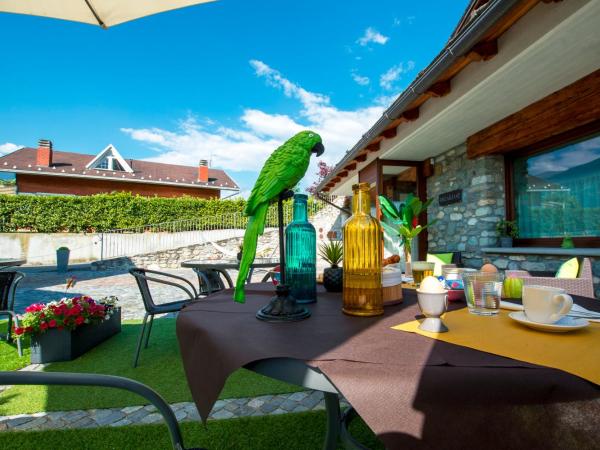 B&B Pousada Rio Aosta-servizi di Bed and breakfast : photo 1 de la chambre chambre double - vue sur jardin