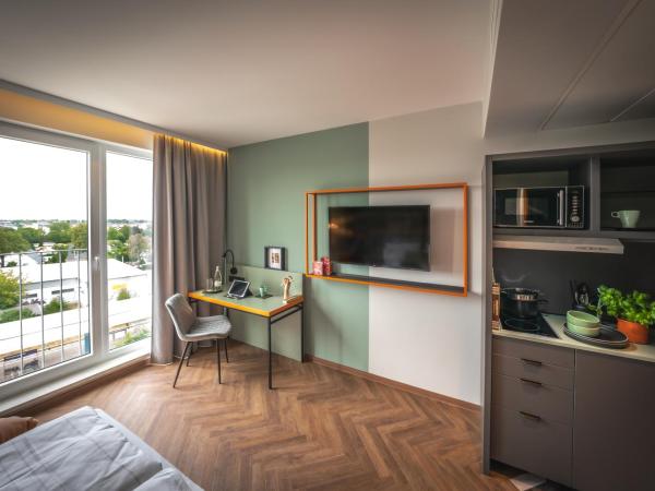 LOGINN Hotel Berlin Airport : photo 4 de la chambre appartement