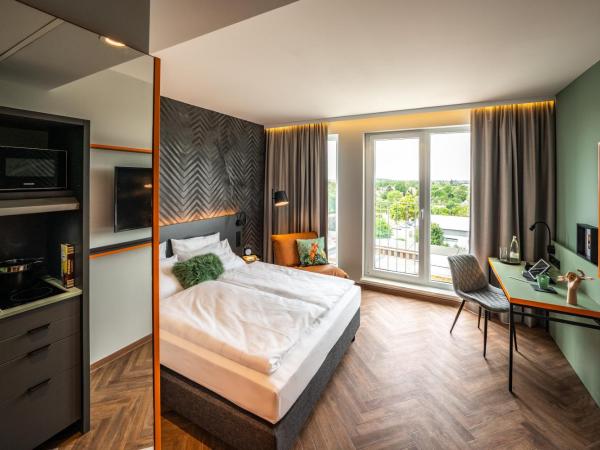 LOGINN Hotel Berlin Airport : photo 8 de la chambre appartement