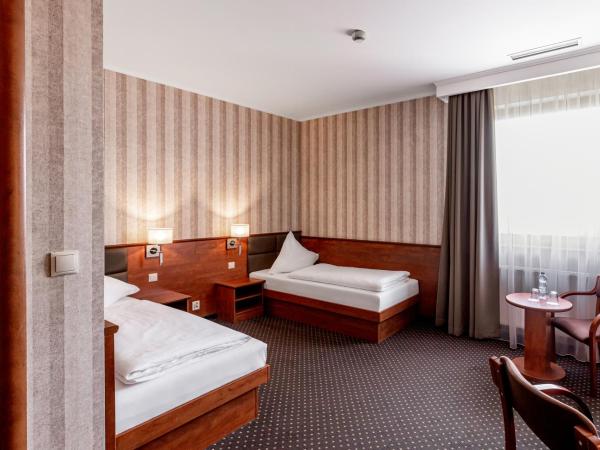 Premium Hotel Bacero Wrocław : photo 6 de la chambre chambre lits jumeaux