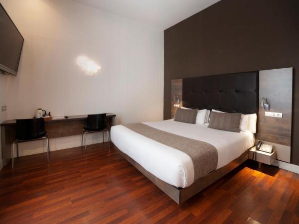 Petit Palace Boqueria Garden : photo 1 de la chambre appartement (4 adultes)