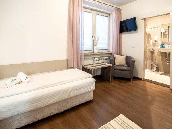 AMADEA - Cityhotel Salzburg : photo 9 de la chambre chambre lits jumeaux