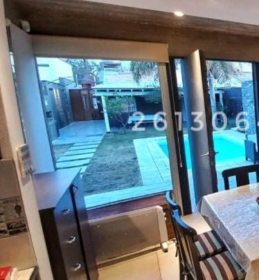 H125 - Complejo Mendoza : photo 3 de la chambre chambre familiale - vue sur jardin