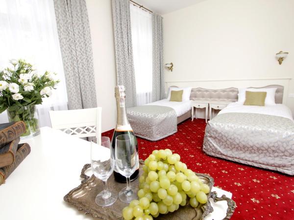 Lawendowy Dworek : photo 1 de la chambre chambre double - vue sur jardin