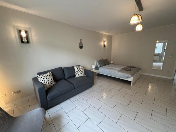 rooms train station : photo 6 de la chambre chambre quadruple avec salle de bains commune