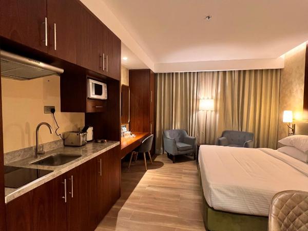 City Seasons Suites : photo 6 de la chambre studio premium