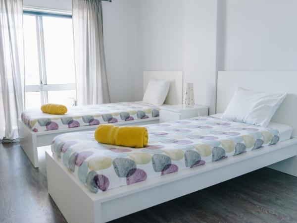 Ocean Guesthouse Peniche : photo 8 de la chambre chambre lits jumeaux