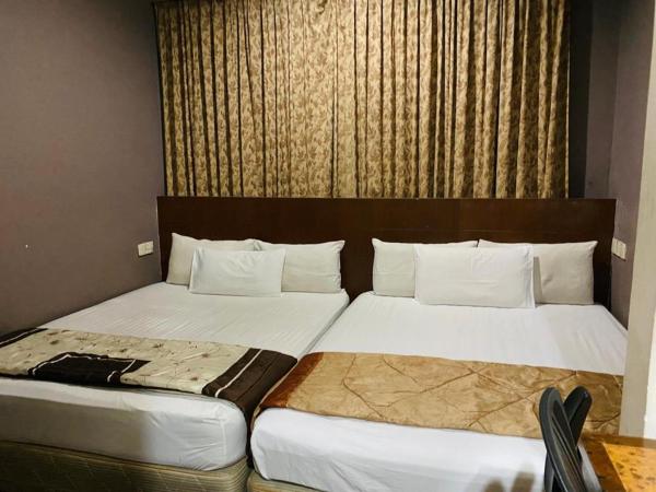 EE HOTEL Johor Jaya : photo 1 de la chambre chambre quadruple