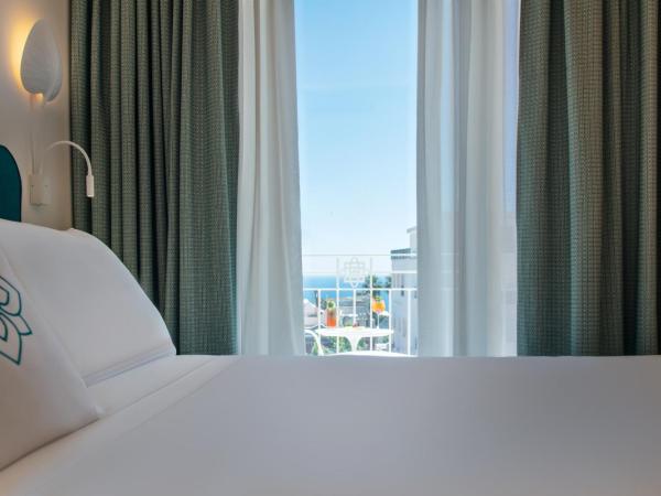 Pazziella Garden & Suites : photo 1 de la chambre chambre double deluxe - vue sur mer