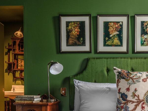 The Corinda Collection : photo 4 de la chambre chambre lit queen-size - vue sur jardin