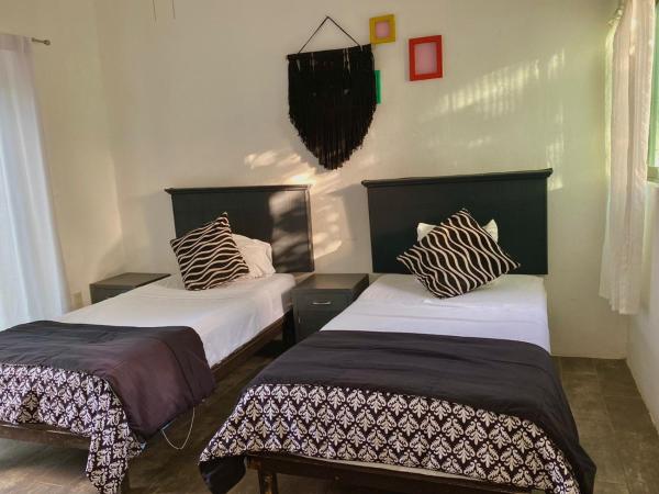 Ecoplaneta by Casa Borush : photo 2 de la chambre chambre lits jumeaux