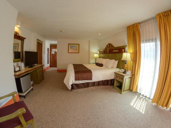Howard Johnson by Wyndham Morelia Calle Real : photo 3 de la chambre suite lit king-size – non-fumeurs