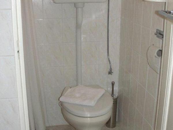 Staten Hotel : photo 3 de la chambre chambre simple ou double avec salle de bains commune