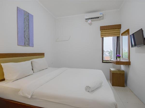 Uptown Residence Syariah Pondok Pinang : photo 1 de la chambre chambre deluxe