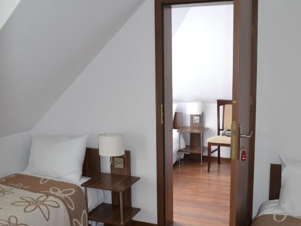 Kalinowy Sen : photo 6 de la chambre chambre triple avec salle de bains commune