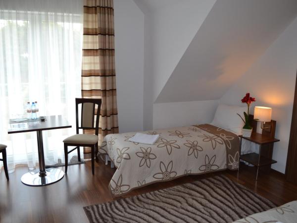 Kalinowy Sen : photo 3 de la chambre chambre double avec salle de bains commune