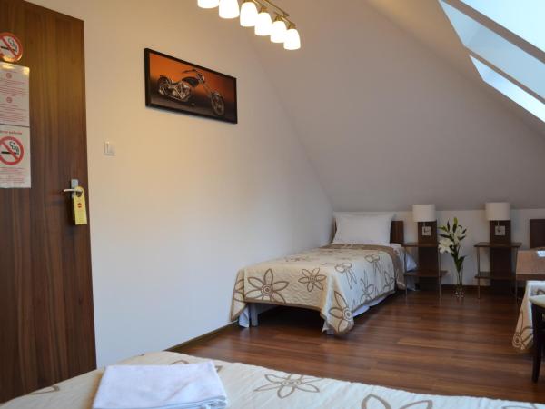 Kalinowy Sen : photo 4 de la chambre chambre triple avec salle de bains commune