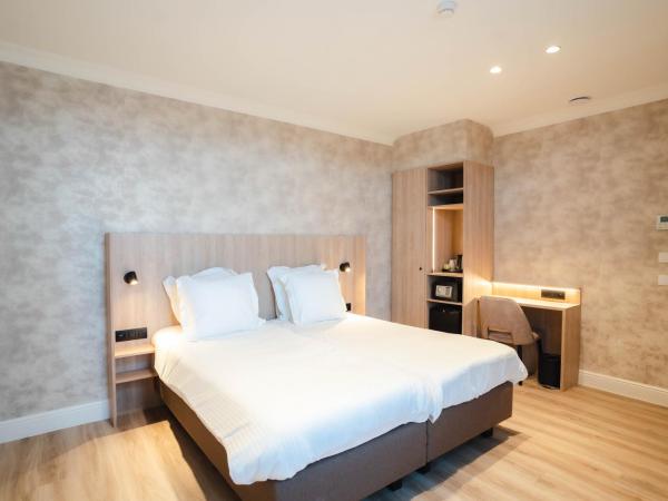 Golden Tree Hotel : photo 2 de la chambre chambre lits jumeaux standard