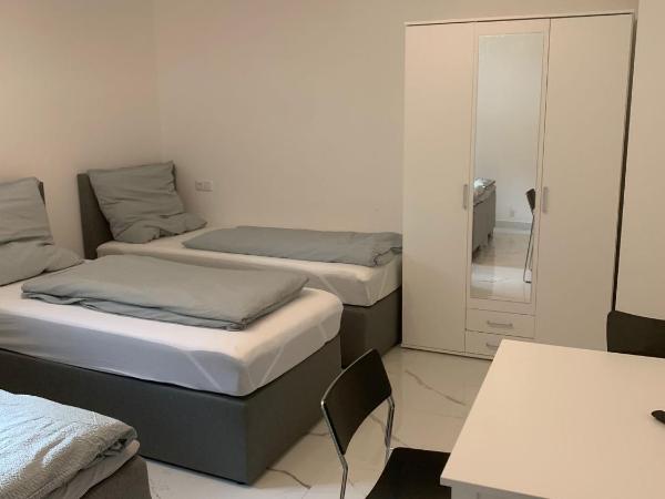 AT-Rooms : photo 4 de la chambre chambre triple