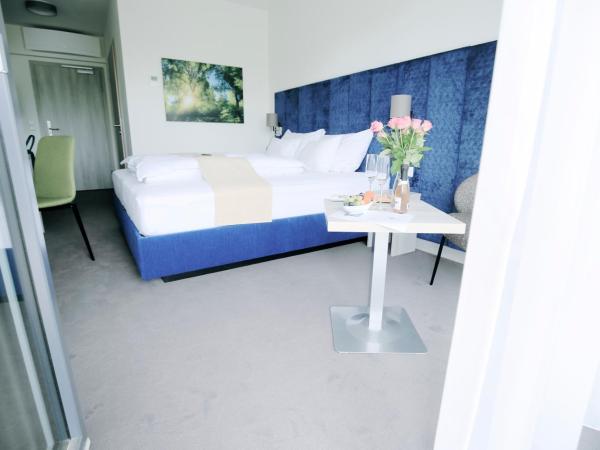 Green Business Hotel am Mühlengrund Graz : photo 2 de la chambre chambre double – vue sur lac