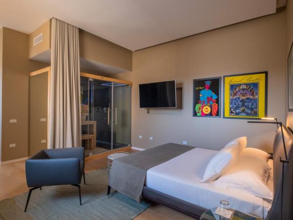 La Fiermontina Palazzo Bozzi Corso Hotel : photo 2 de la chambre suite bien-être avec sauna