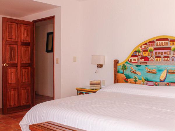 Casa Rosa Mexicano : photo 2 de la chambre chambre lit king-size deluxe