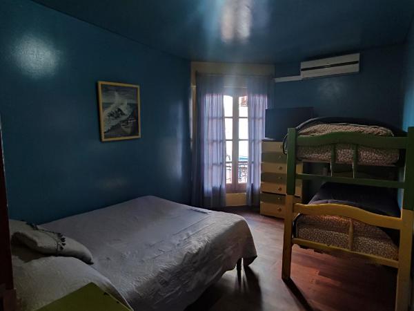 Hostel Ruca Potu : photo 2 de la chambre chambre quadruple avec salle de bains commune
