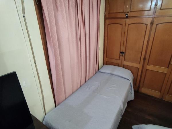 Hostel Ruca Potu : photo 4 de la chambre chambre triple avec salle de bains privative