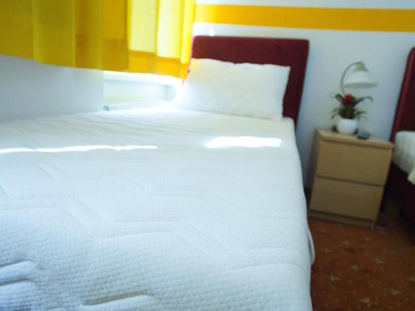 Hotel City Residence : photo 4 de la chambre chambre lits jumeaux