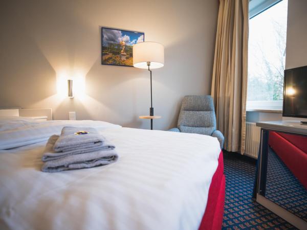 Hotel in Herrenhausen : photo 4 de la chambre chambre simple