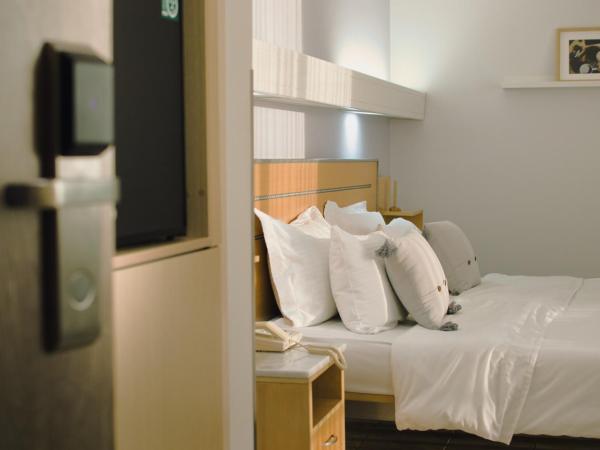 Acropol Hotel : photo 6 de la chambre chambre lits jumeaux avec lit d’appoint - 301