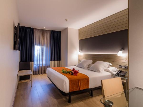 Hotel Avenida : photo 4 de la chambre chambre double ou lits jumeaux