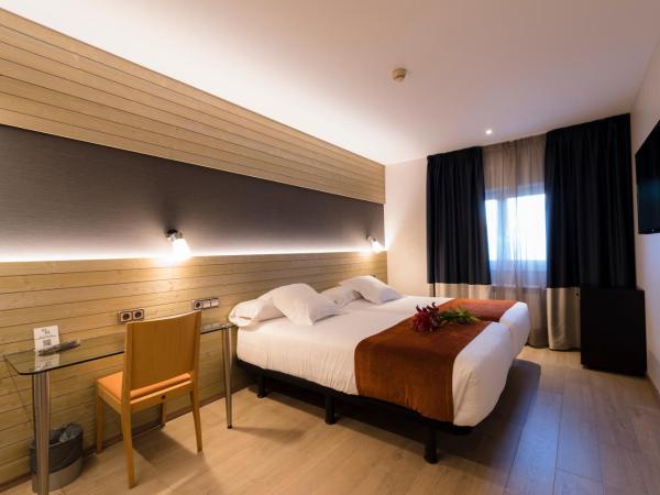 Hotel Avenida : photo 2 de la chambre chambre double ou lits jumeaux