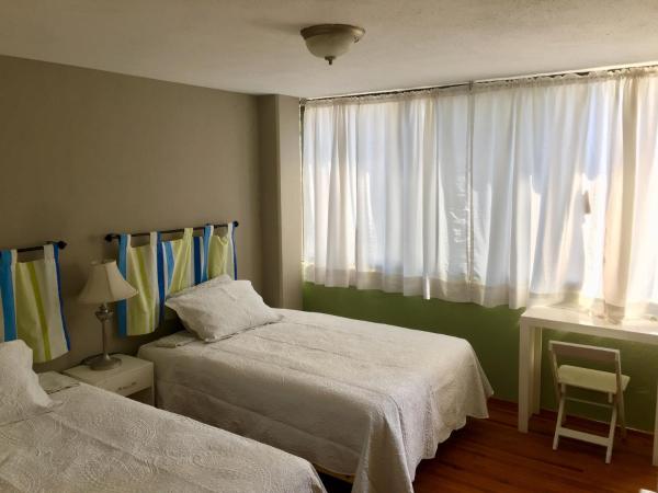 Satya Suites & Portal San Angel Flats : photo 9 de la chambre chambre lits jumeaux standard