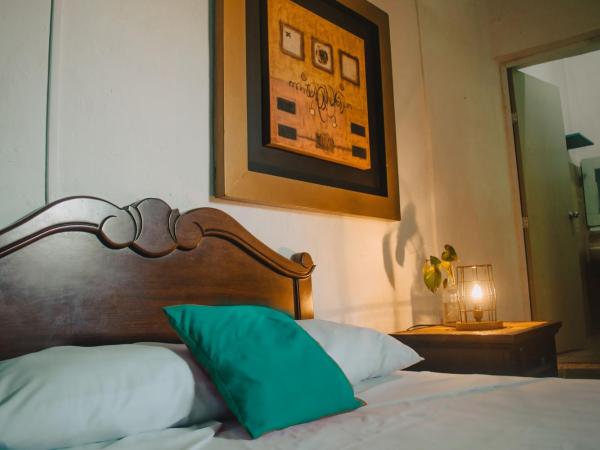 La Casa del Kéej Hostel : photo 1 de la chambre chambre double standard avec 2 lits doubles