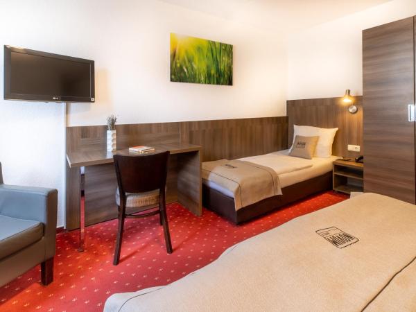 Hotel Leonet : photo 2 de la chambre chambre triple standard