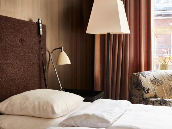 First Hotel Grand : photo 1 de la chambre hébergement lits jumeaux séparables