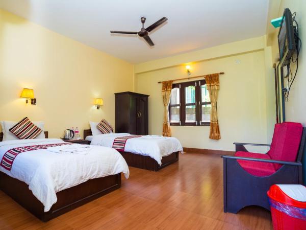 Butterfly Lodge : photo 2 de la chambre chambre triple deluxe