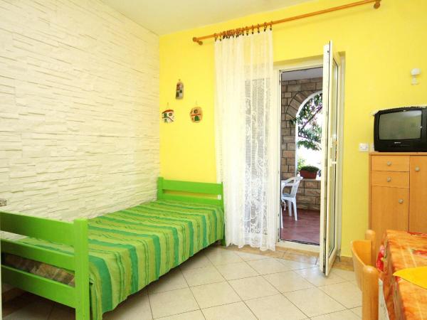 Apartments and rooms with a swimming pool Novalja, Pag - 9334 : photo 1 de la chambre appartement 1 chambre avec terrasse