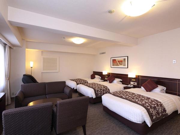 Nishitetsu Grand Hotel : photo 1 de la chambre chambre triple de luxe - non-fumeurs