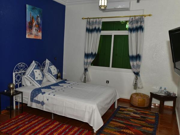 Riad Parfums de OUARZAZATE : photo 2 de la chambre chambre lit king-size deluxe