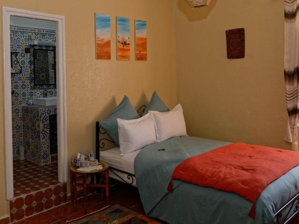 Riad Parfums de OUARZAZATE : photo 5 de la chambre chambre deluxe