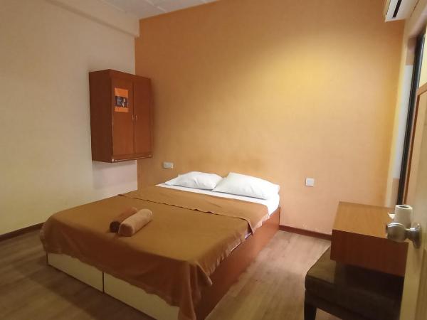 Straits Settlement Inn : photo 1 de la chambre chambre double standard