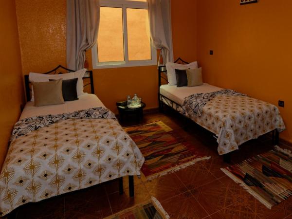 Riad Parfums de OUARZAZATE : photo 6 de la chambre chambre familiale avec salle de bains